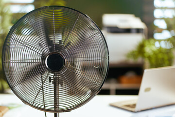 electric fan in modern green office