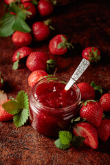 Strawberry jam and fresh berries.