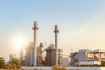 Gas turbine electrical power plant in evening sunset power for factory energy concept.