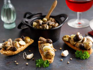 Mushrooms in garlic butter sauce.