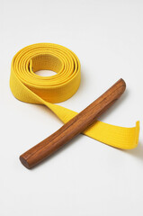 yellow belt and tanto sword isolated on white background