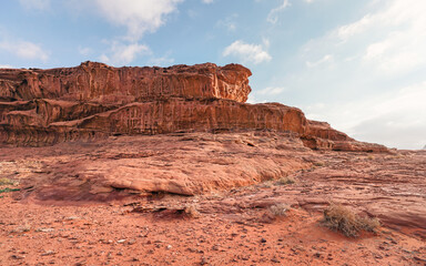 Red orange sandstone rocks formations in Wadi Rum (also known as Valley of the Moon) desert, Jordan