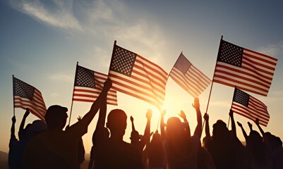 Patriotic holiday. Silhouettes of people holding the Flag of the USA. America celebrate 4th of July