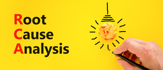 RCA root cause analysis symbol. Concept words RCA root cause analysis on yellow paper. Beautiful...