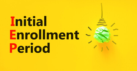 IEP symbol. Concept words IEP Initial enrollment period on beautiful yellow paper. Beautiful yellow...