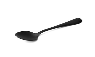 Black spoon on white isolated