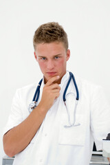 Fototapeta premium young doctor or student looking serious at you