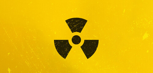 Radioactivity Sign and Nuclear Radiation Concept Image. Letter Tiles on Yellow Background. Minimal...