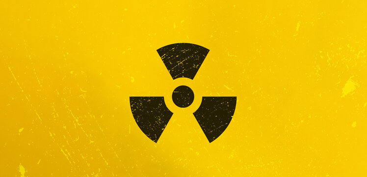 Radioactivity Sign and Nuclear Radiation Concept Image. Letter Tiles on Yellow Background. Minimal Aesthetics.