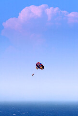 Fototapeta na wymiar Couple in air, paraglider