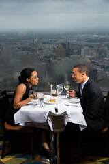 African-American couple having dinner at the Tower of the Americas in San Antonio, Texas.