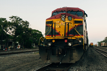 front of Train head yellow or locomotive on the tracks