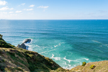 Cliff top view on Sopelana beach near Bilbao. Day of relaxation and tranquility with little wind and incredible colors.