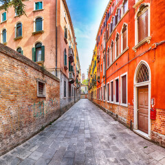 Fototapeta na wymiar Fabulous cityscape of Venice with narrow streets and traditional buildings.