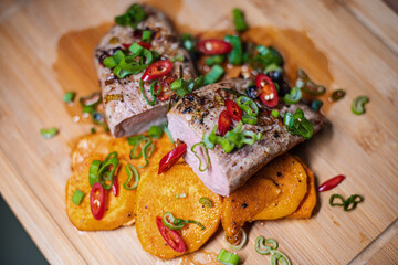 Succulent Pork Tenderloin with Sweet Potatoes and Fresh Chili