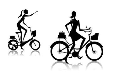 The woman going on a bicycle with purchases from shop