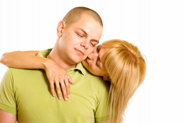 Beautiful blond woman portrait close up kissing man