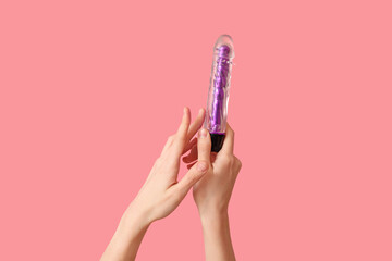 Woman with vibrator from sex shop on pink background - obrazy, fototapety, plakaty