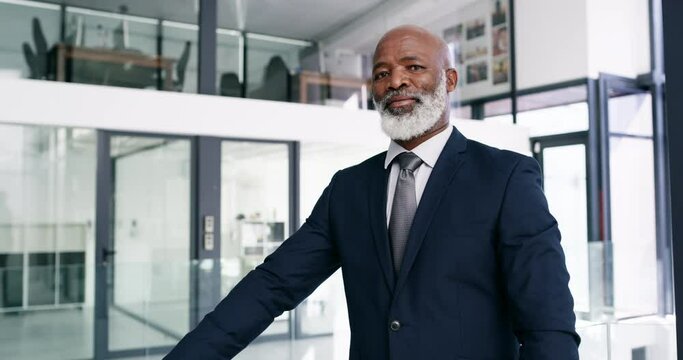 Mindset, professional and a senior business black man standing arms crossed in his corporate office for work. Portrait, management and focus with a mature male CEO in his company for leadership