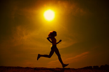 girl runs on sand