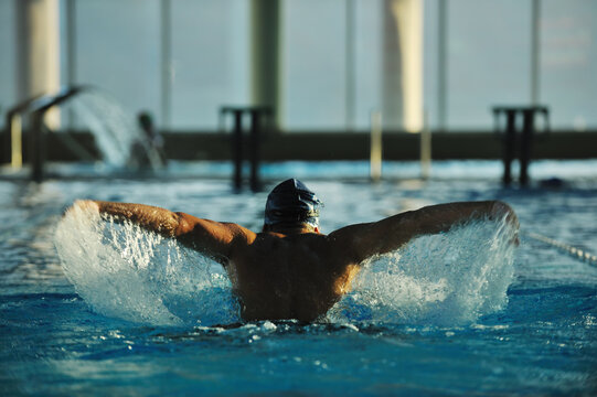 health and fitness lifestyle concept with young athlete swimmer recreating  on olimpic pool