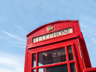 Fototapeta na wymiar Famous red phone box in Pennan, Scotland from the film Local Hero