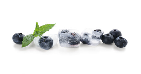 Fresh blueberry frozen in ice cubes and mint on white background