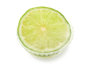 Slice of fresh lime frozen in ice on white background