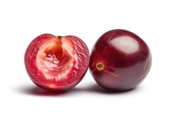 Obraz premium whole pomegranate next to a cut in half pomegranate Generative AI