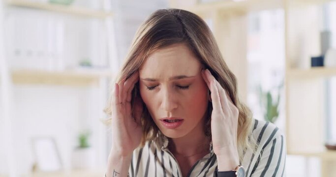 Burnout, stress or business woman with headache in office from depression, mental health or anxiety for work. Tired, mental health or sad employee frustrated, angry and head pain from tax audit
