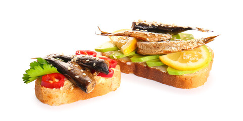 Tasty sandwiches with canned smoked sprats on white background