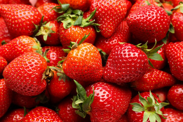 Texture of fresh strawberries as background