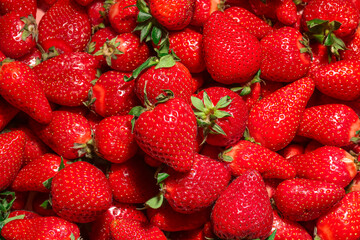 Texture of fresh strawberries as background