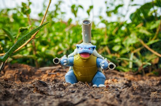 May 11 2023 - Figure   Pokemon - Toy Photography - Blastoise is walking through the forest in the rain.