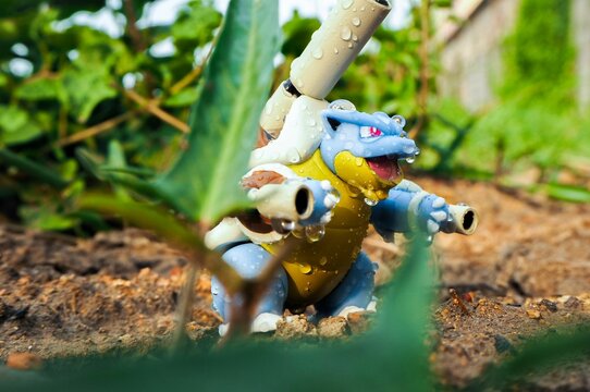 May 11 2023 - Figure   Kamex (Blastoise) Pokemon - Toy Photography - Blastoise is walking through the forest in the rain.