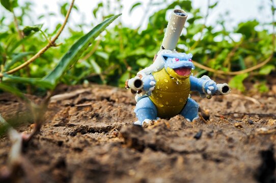 May 11 2023 - Figure   Pokemon - Toy Photography - Blastoise is walking through the forest in the rain.