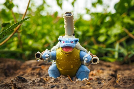 May 11 2023 - Figure   Kamex (Blastoise) Pokemon - Toy Photography - Blastoise is walking through the forest in the rain.