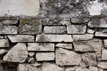Old stone wall. Old construction or architectural background.