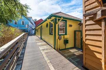 Naklejka premium Historic shops along Married Man Trail at Creek Street, a popular tourist area in the Alaskan town of Ketchikan, Alaska, USA.