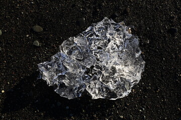 View of an iceberg on the beach of Breiðamerkursandur which is a glacial outwash plain in southeast Iceland.