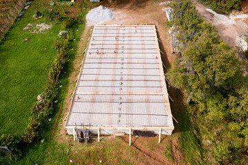 Aerial Drone Shot Of Foundations, Construction Site Platform and armature