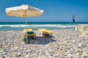 beach chairs and umbrellas