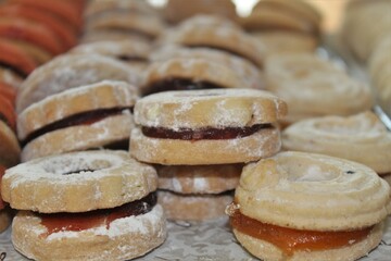 Biscuits with jam and icing sugar on top