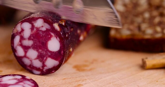 sliced high-quality pork sausage with the addition of lard pieces, ready-made food products with the use of pork meat