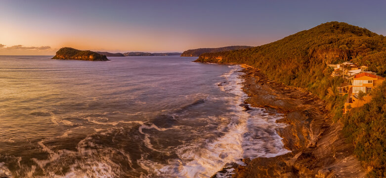 Aerial sunrise panorama over the sea from the headland