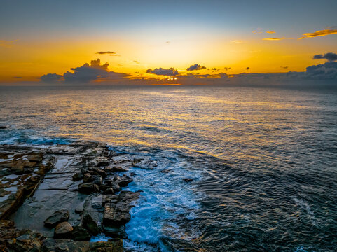 Sunrise sea views and rocky inlet