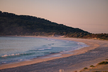 Fototapeta na wymiar Early morning, sunrise at Jimmy's Beach. Hawks Nest NSW Australia