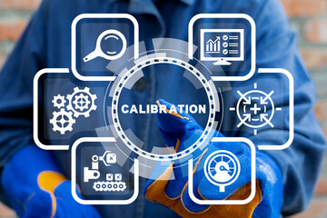 Technician using virtual touchscreen clicks text: CALIBRATION. Concept of activate calibration,...