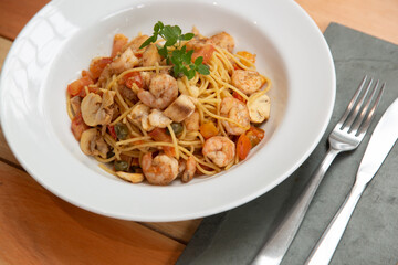 Dish of spaghetti pasta with shrimp sauce, Italian dish, pasta