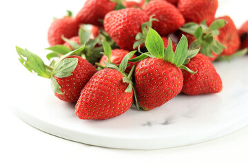 Red Strawberry on White Ceramic Board